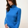 AVA pull col roulé azur